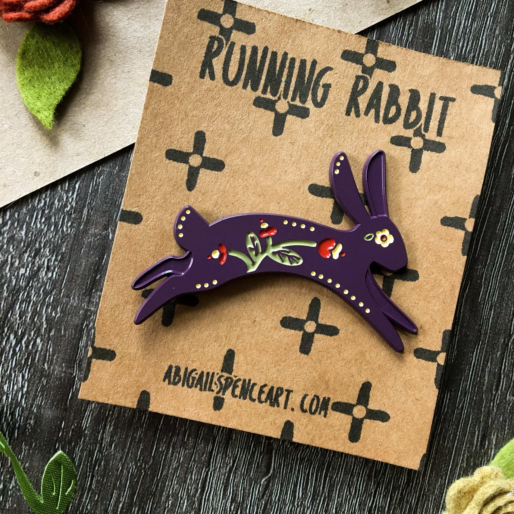 running rabbit enamel pin